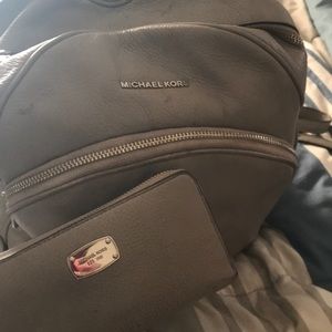 Matching Michael Kors backpack and wallet